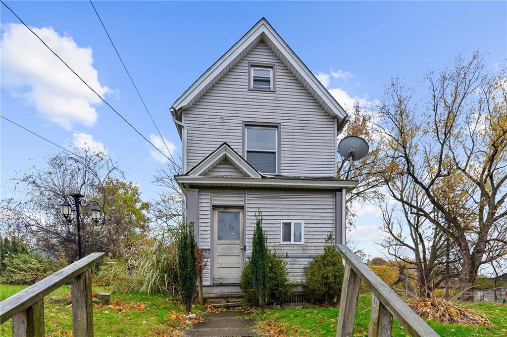 282 Orchard Street Sharon, PA 16146 - Photo 17 of 17 a front view of a house with a yard