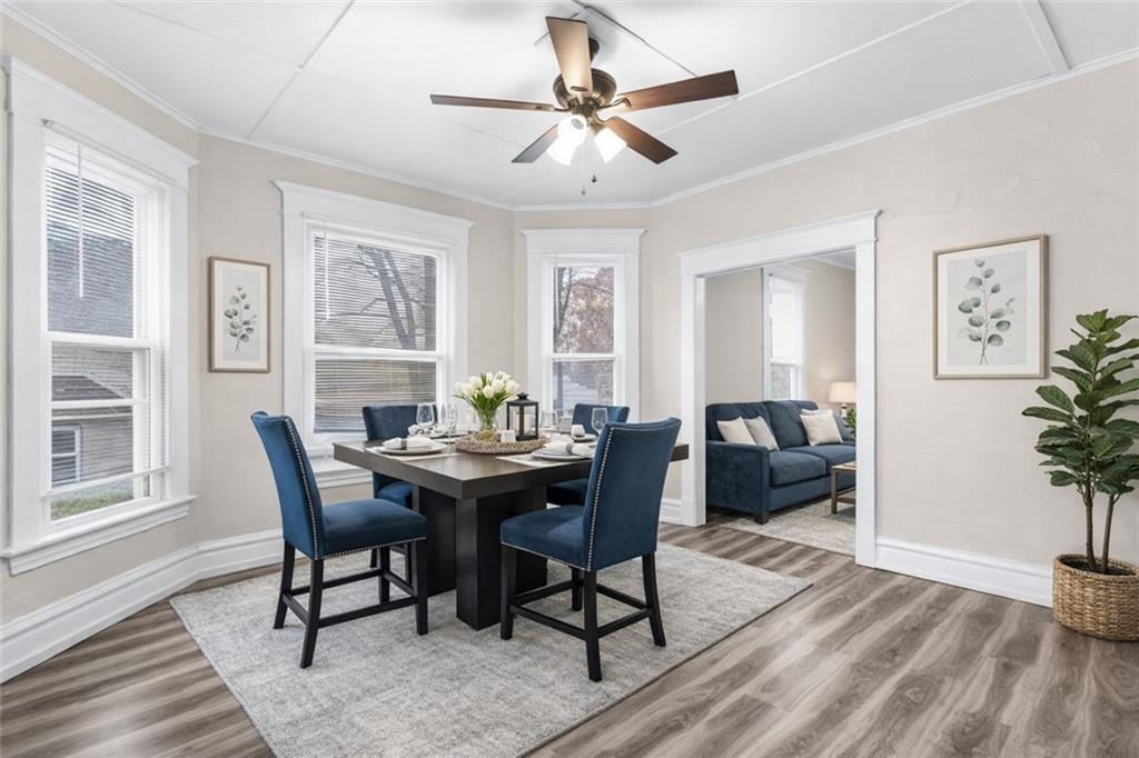 282 Orchard Street Sharon, PA 16146 - Photo 4 of 16 a view of a dining room with furniture window and wooden floor