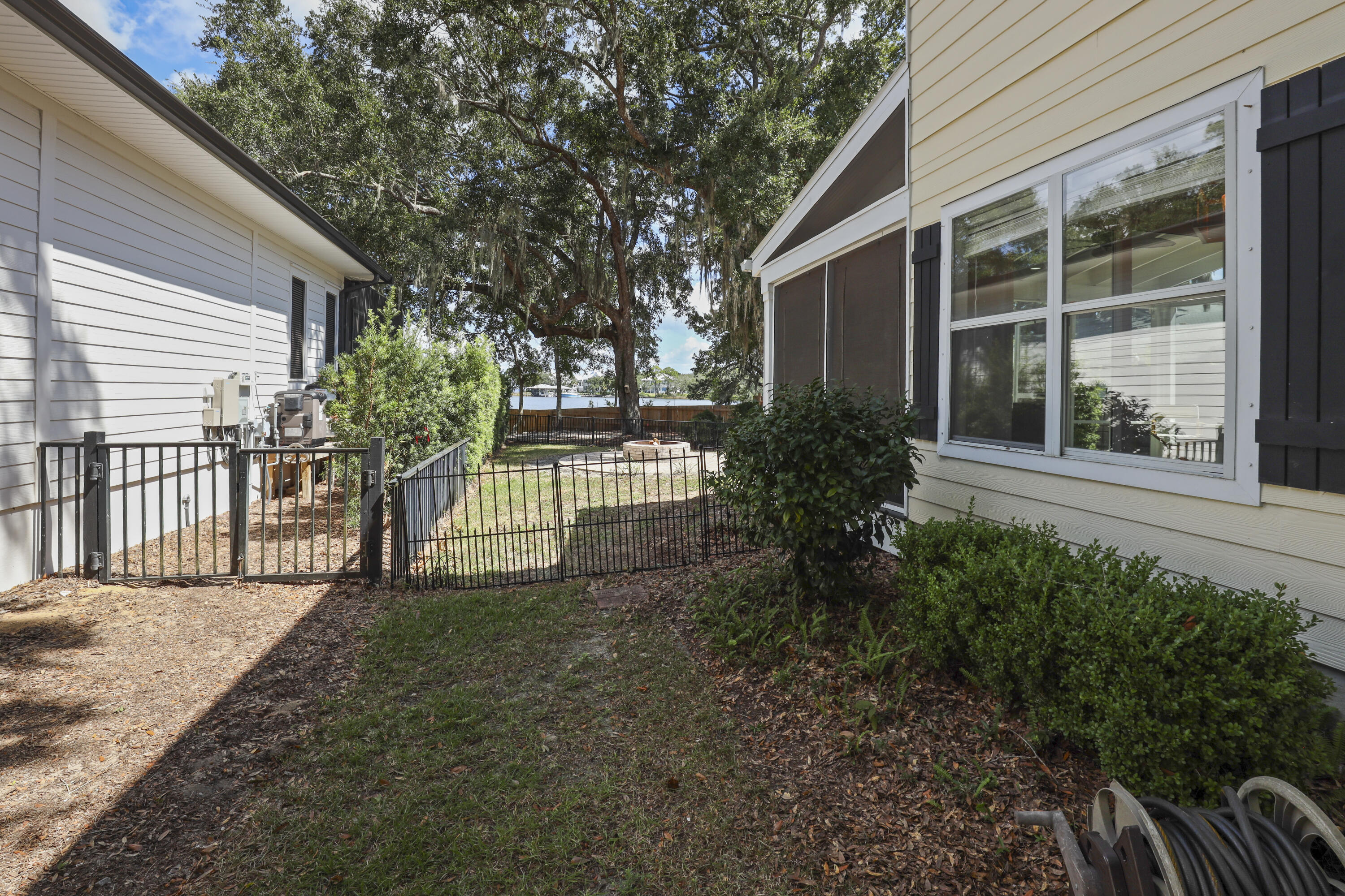 159 Beacon Point Drive Santa Rosa Beach, FL 32459 - Photo 24 of 57 a view of a house with a yard
