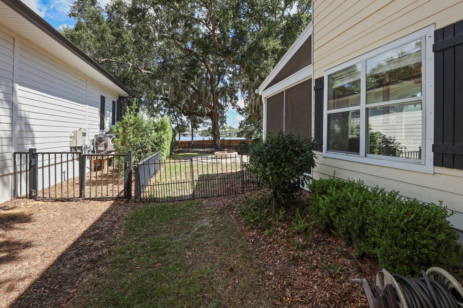 159 Beacon Point Drive Santa Rosa Beach, FL 32459 - Photo 26 of 57 a view of a house with a yard