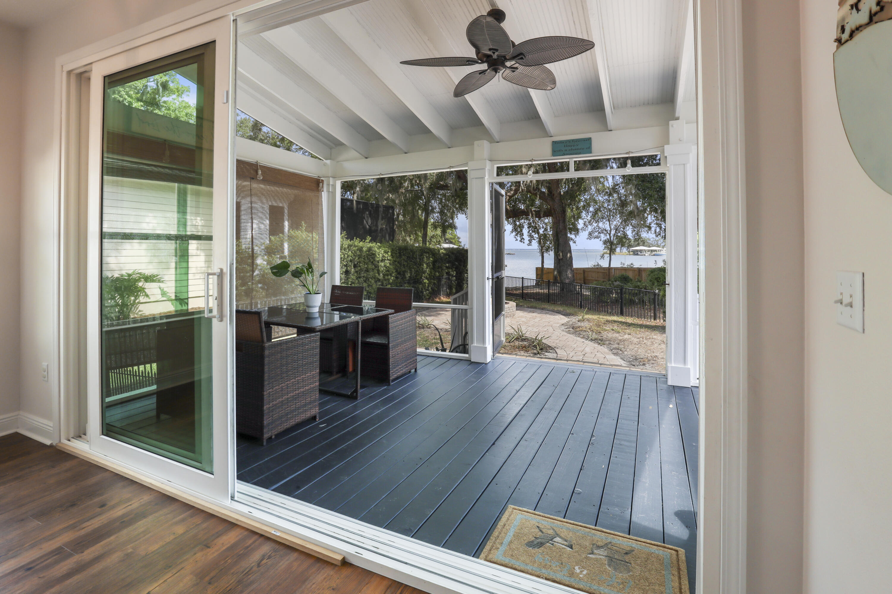 159 Beacon Point Drive Santa Rosa Beach, FL 32459 - Photo 3 of 57 a room with wooden floor and balcony