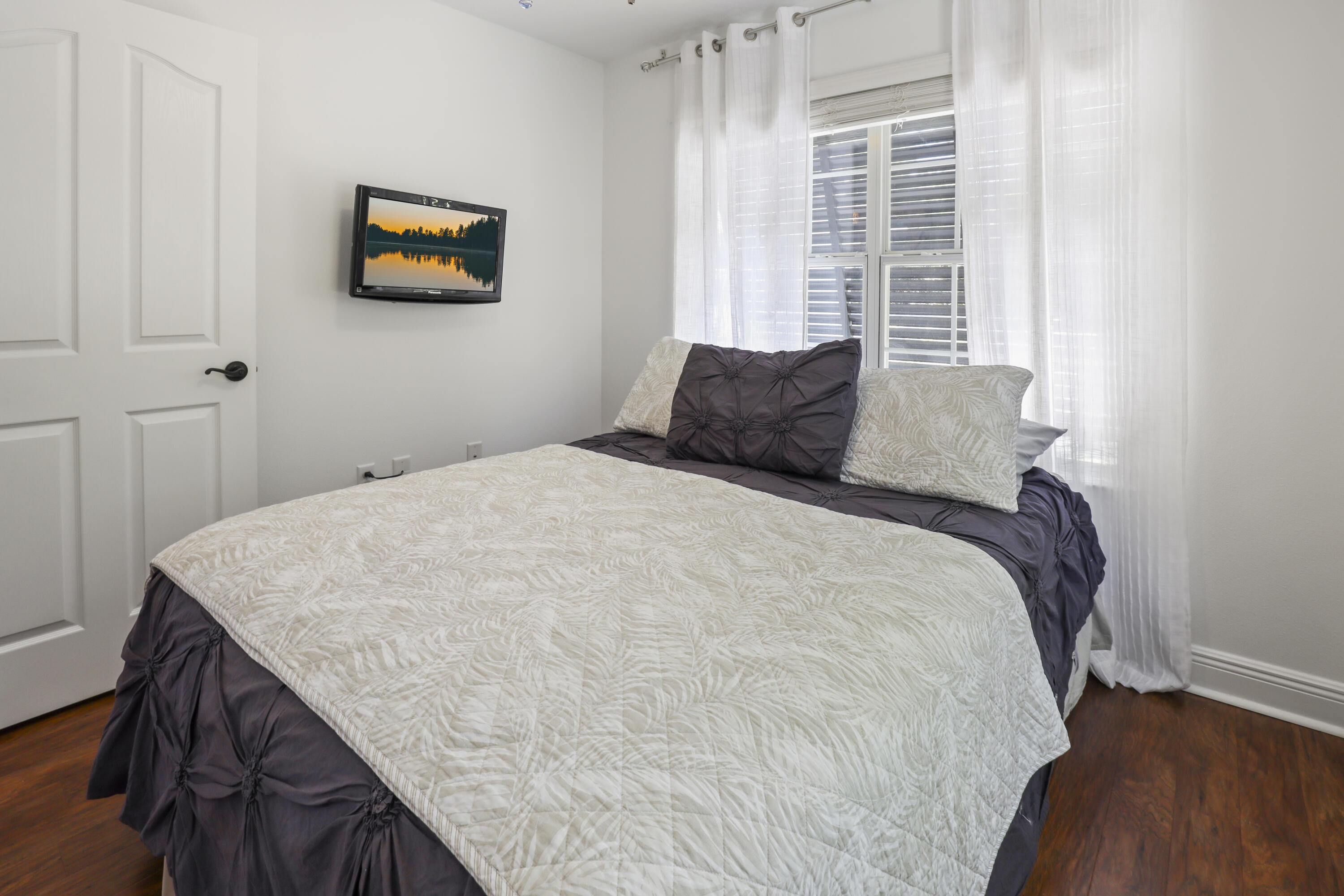 159 Beacon Point Drive Santa Rosa Beach, FL 32459 - Photo 48 of 57 a bedroom with a bed and a window