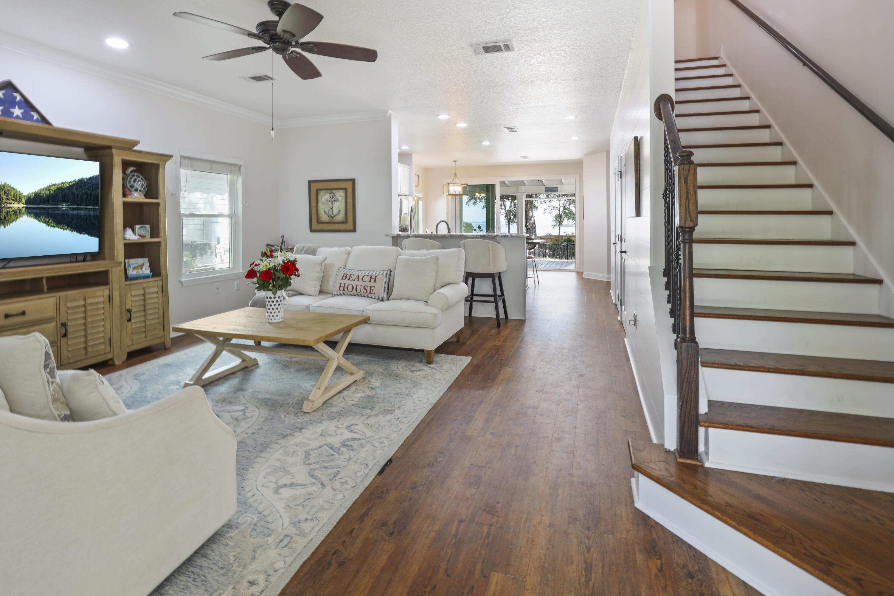 159 Beacon Point Drive Santa Rosa Beach, FL 32459 - Photo 9 of 57 a living room with furniture and wooden floor