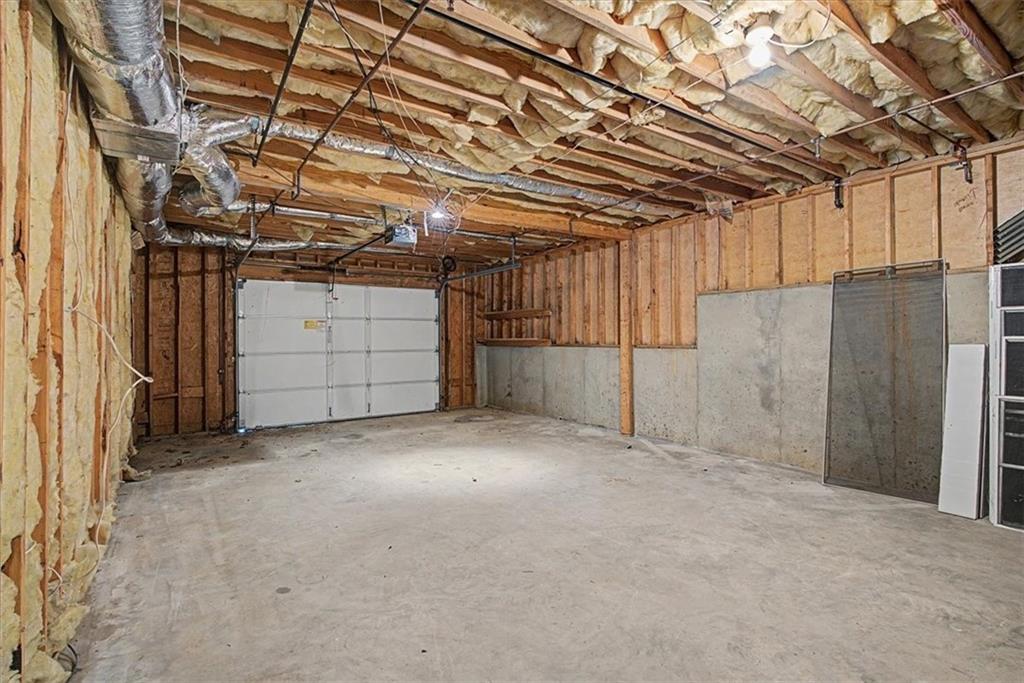 1136 Cole Lake Road Dallas, GA 30157 - Photo 53 of 72 a view of empty room with wooden walls