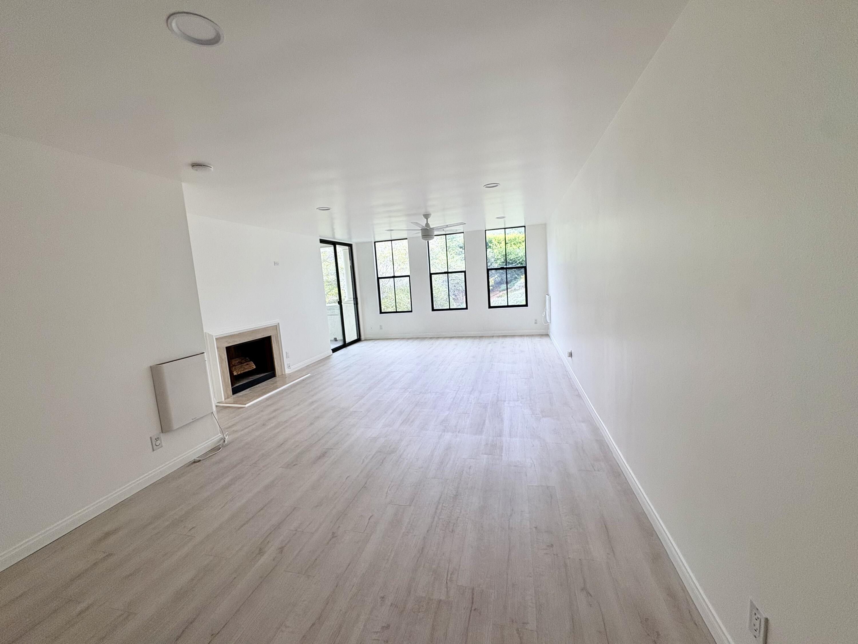1220 Coast Village Road, Unit 304 Santa Barbara, CA 93108 - Photo 5 of 17 long view of living - nice
