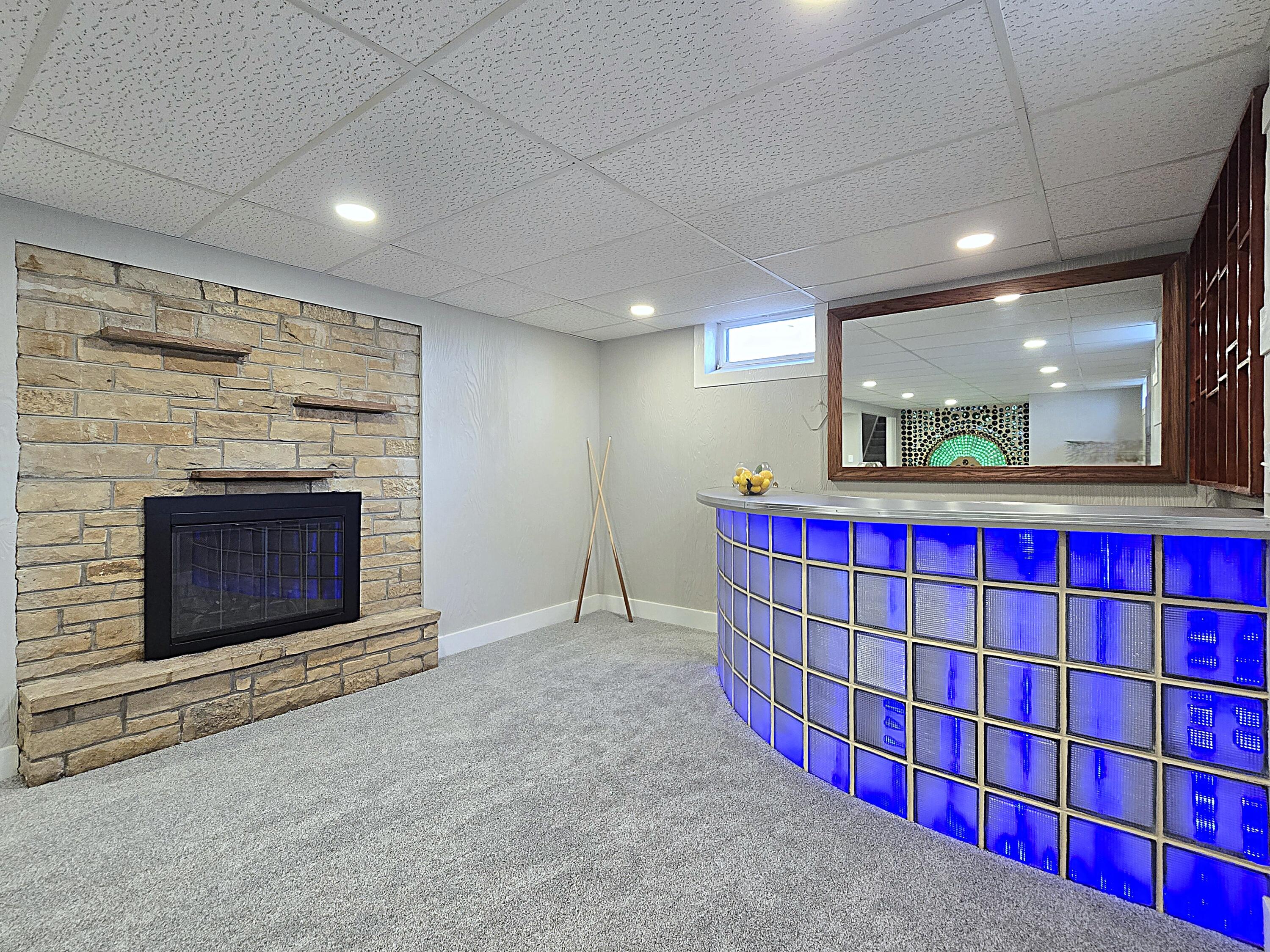 4760 North 159th Street Brookfield, WI 53005 - Photo 30 of 55 Rec Room Bar and Fireplace