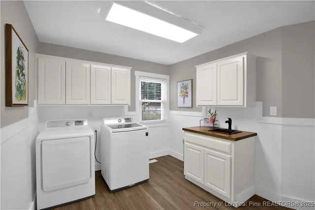 a huge green field with lots of trees