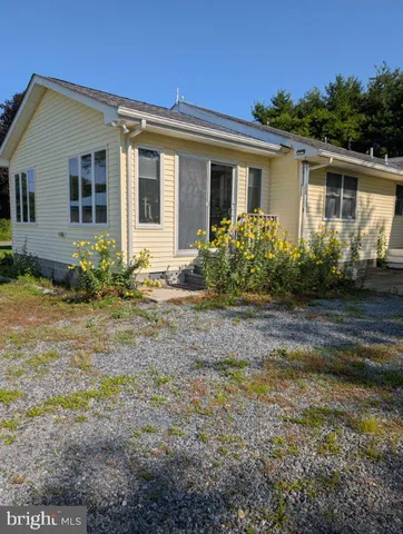 a front view of house with yard