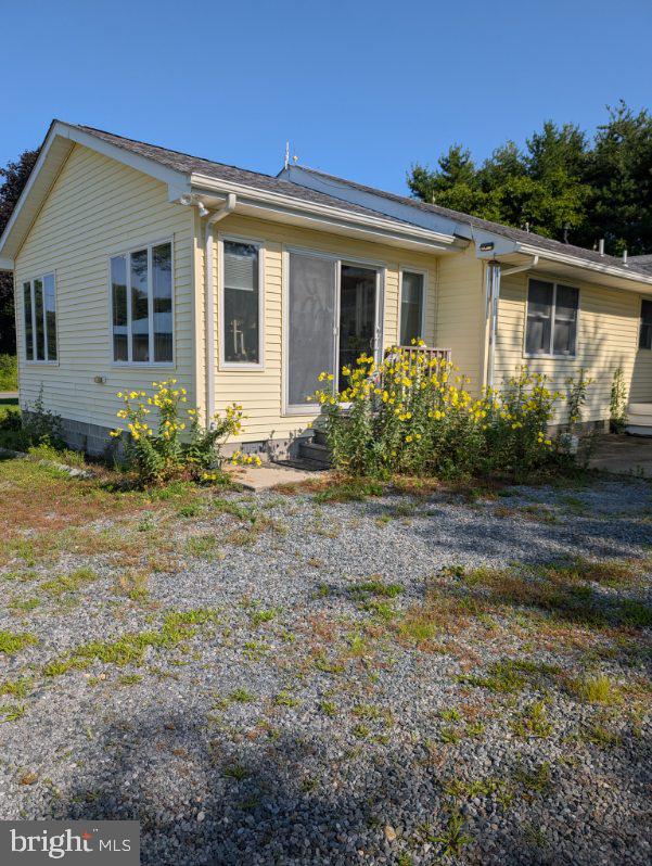 12615 Eveland Road Ridgely, MD 21660 - Photo 2 of 28 a front view of house with yard