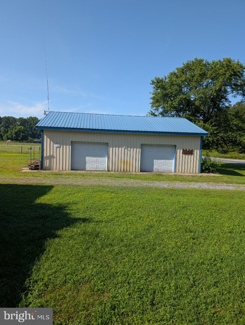 12615 Eveland Road Ridgely, MD 21660 - Photo 25 of 28 a house view with a garden space