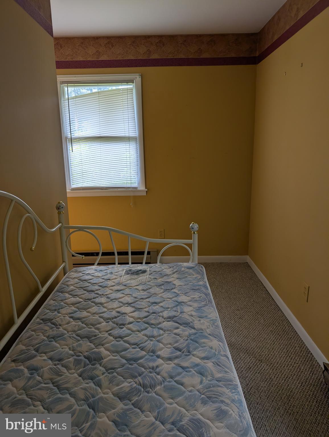 12615 Eveland Road Ridgely, MD 21660 - Photo 4 of 28 a room with a wooden floor and a window