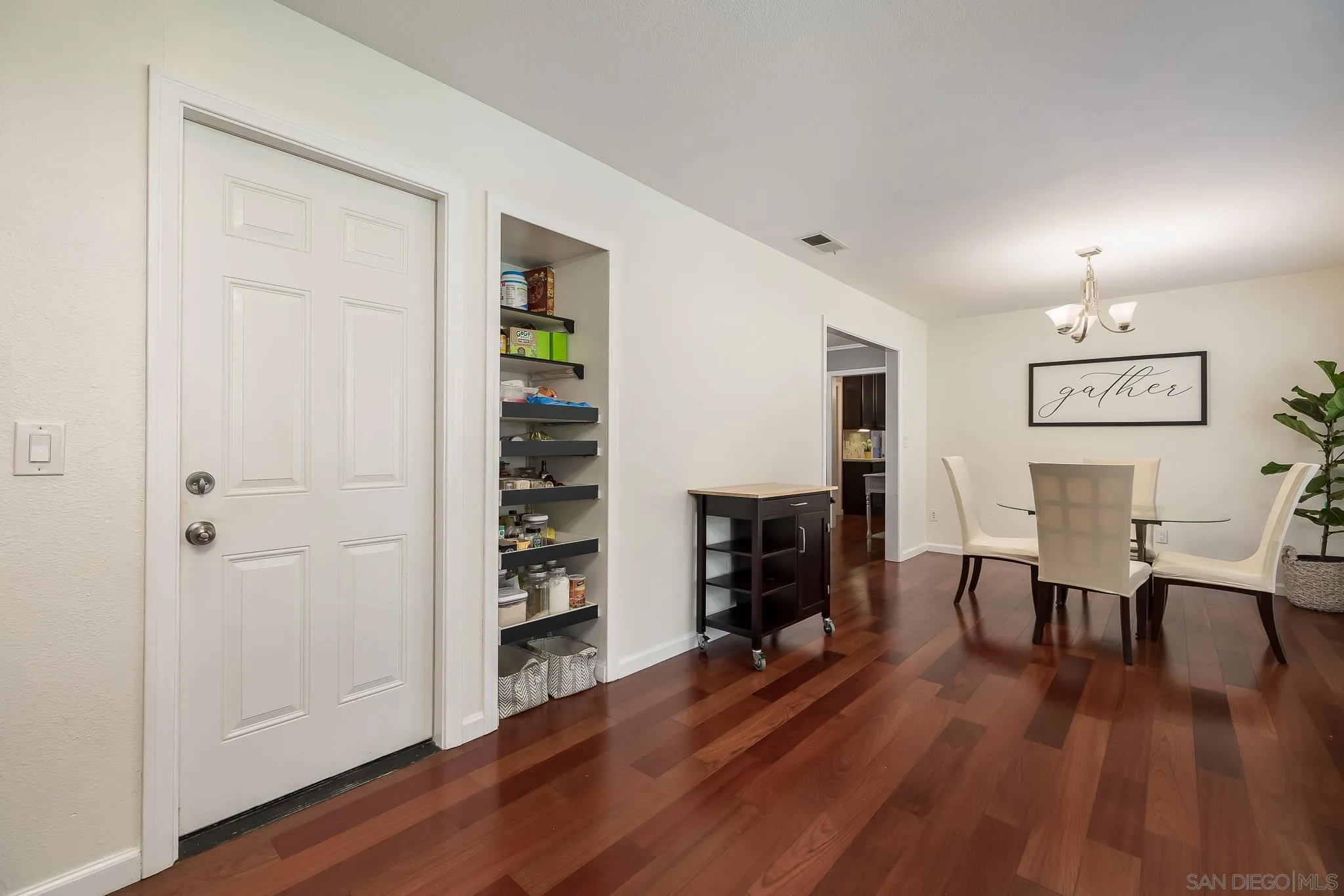 9731 Domer Road Santee, CA 92071 - Photo 13 of 32 a view of a livingroom with furniture and wooden floor