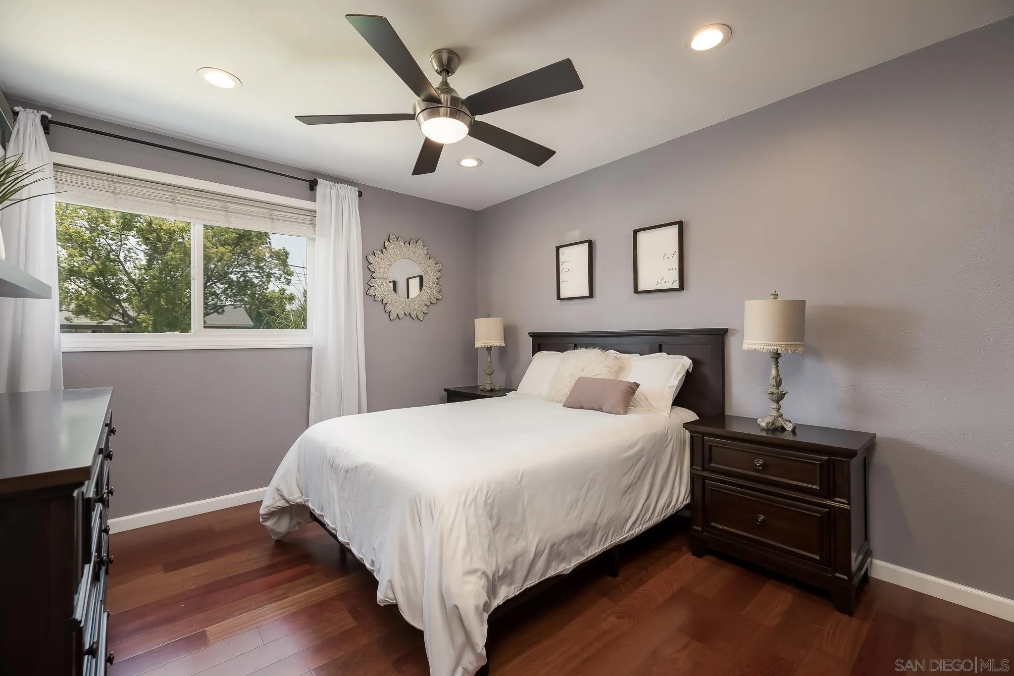 9731 Domer Road Santee, CA 92071 - Photo 14 of 32 a bedroom with a bed and a window