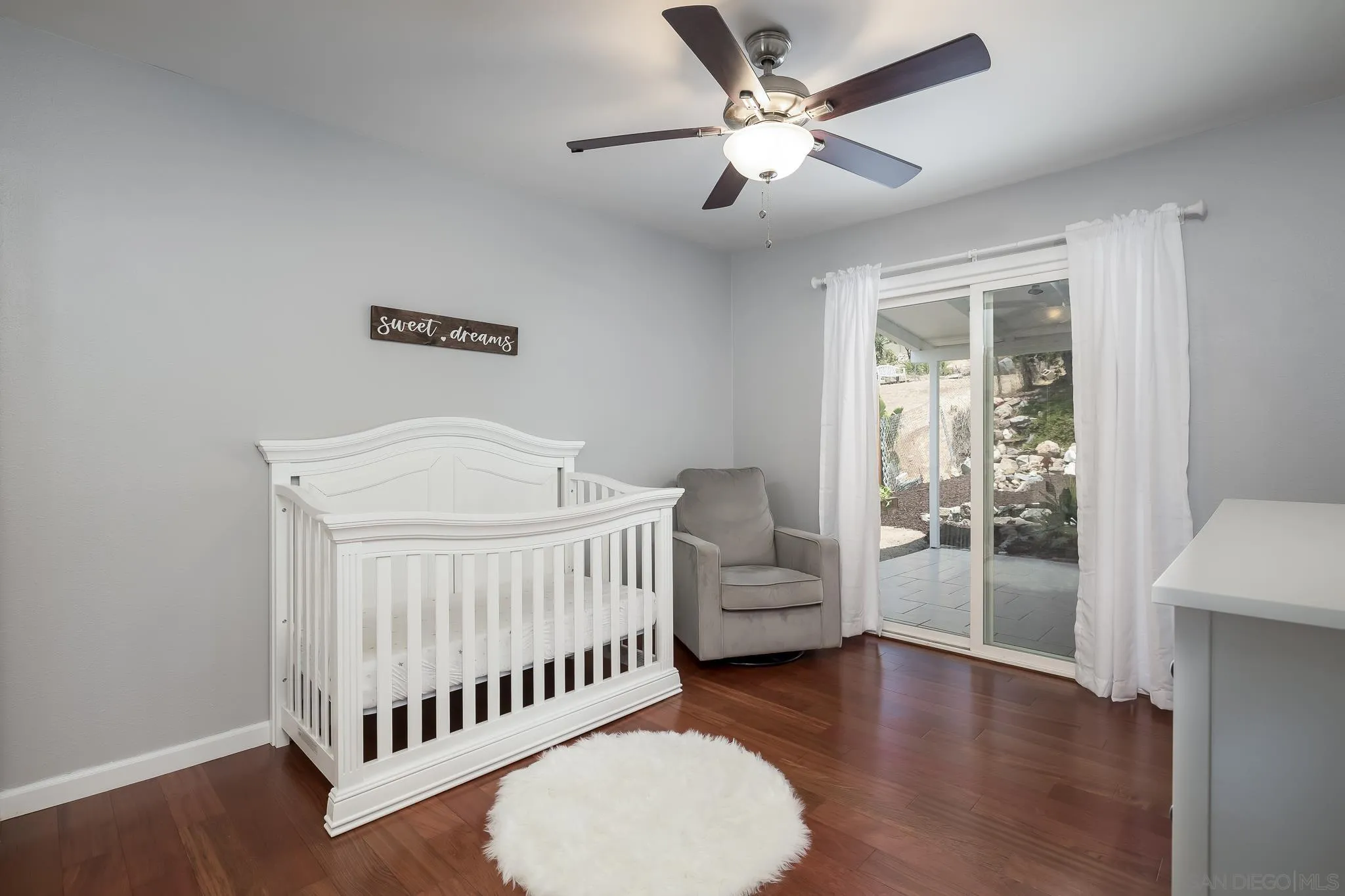 9731 Domer Road Santee, CA 92071 - Photo 19 of 32 a bedroom with furniture and a window