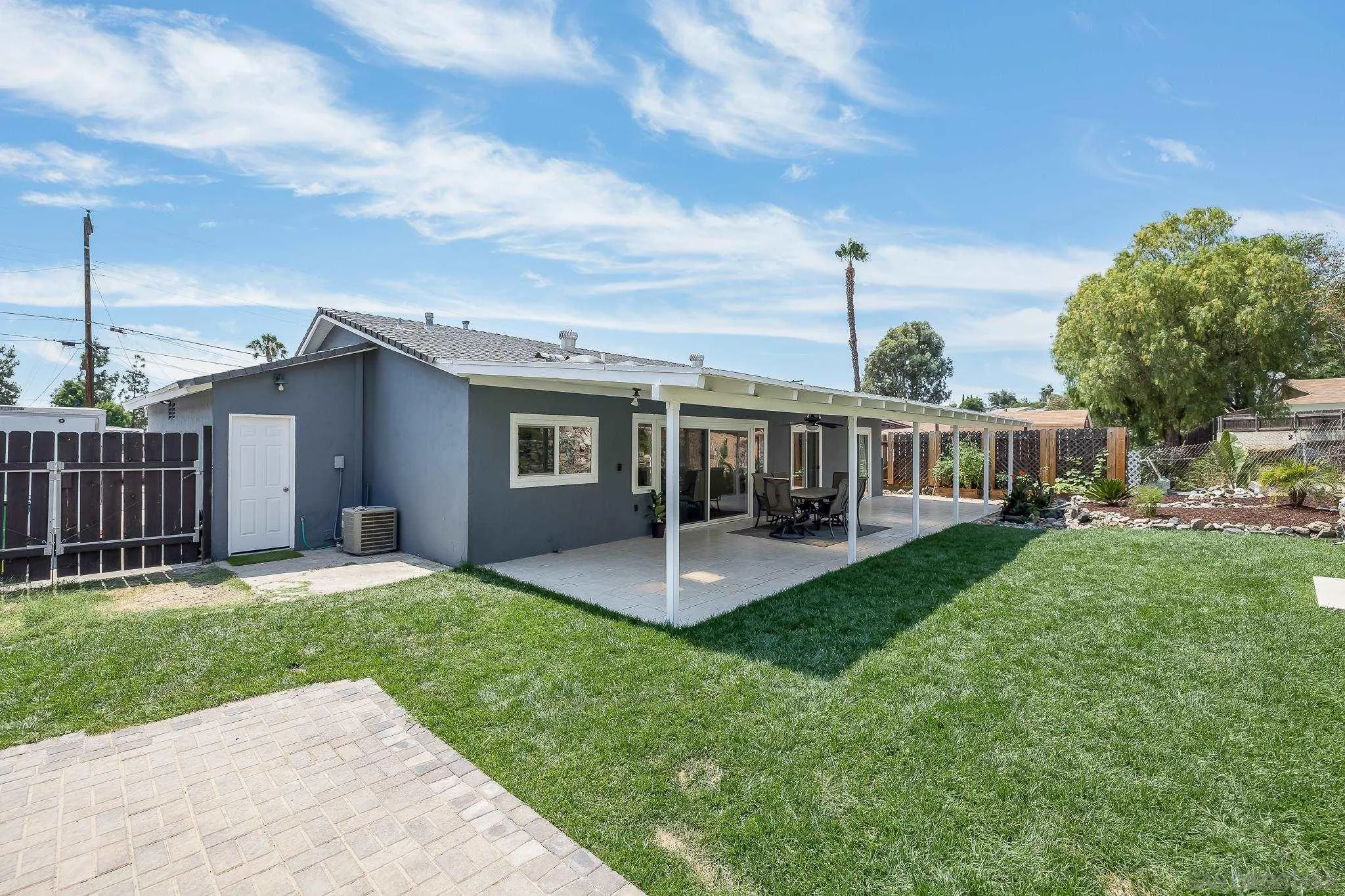 9731 Domer Road Santee, CA 92071 - Photo 24 of 32 a view of a house with backyard and porch