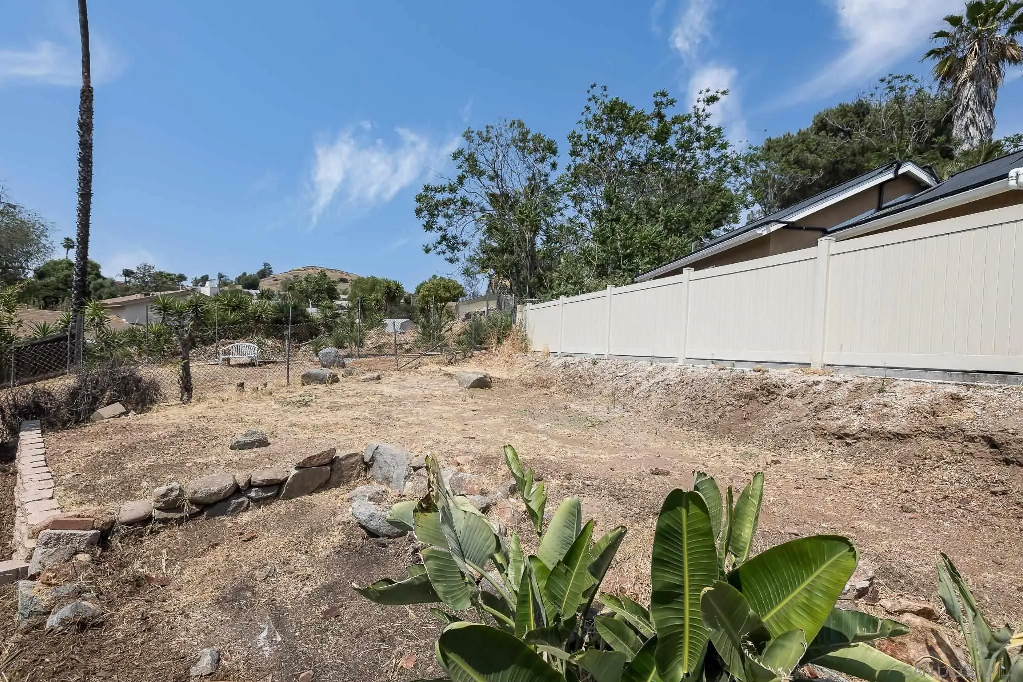 9731 Domer Road Santee, CA 92071 - Photo 29 of 32 a view of a yard with a tree