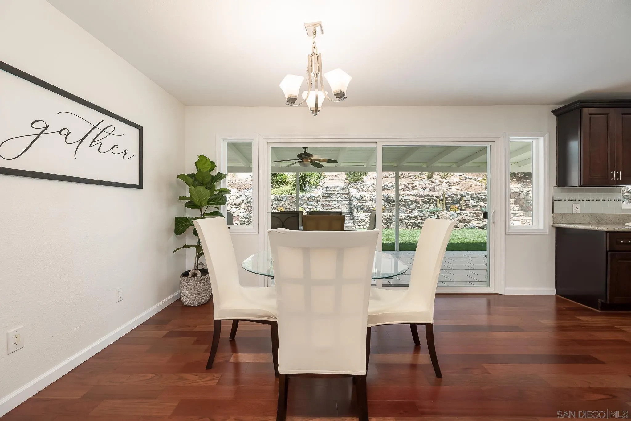 9731 Domer Road Santee, CA 92071 - Photo 10 of 32 a view of a dining room with furniture window and wooden floor