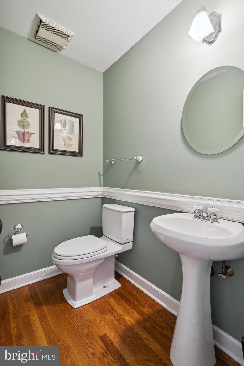 792 Avonwood Drive Wayne, PA 19087 - Photo 14 of 35 a bathroom with a toilet sink and mirror