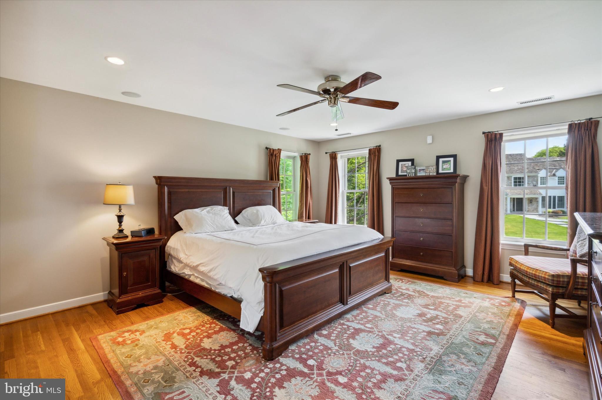 792 Avonwood Drive Wayne, PA 19087 - Photo 23 of 35 a spacious bedroom with a bed and a dresser in it