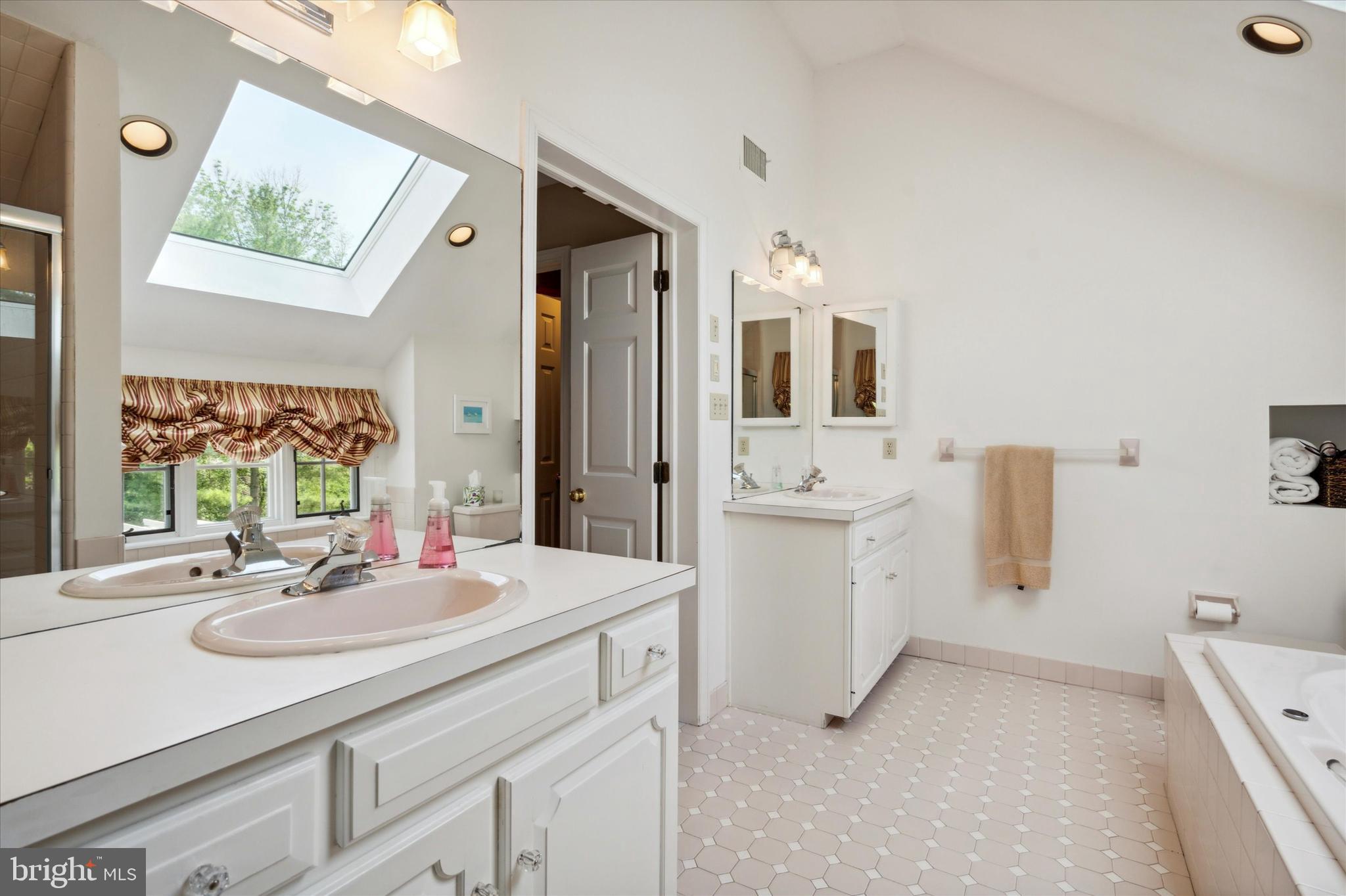 792 Avonwood Drive Wayne, PA 19087 - Photo 25 of 35 a bathroom with a sink vanity and mirror