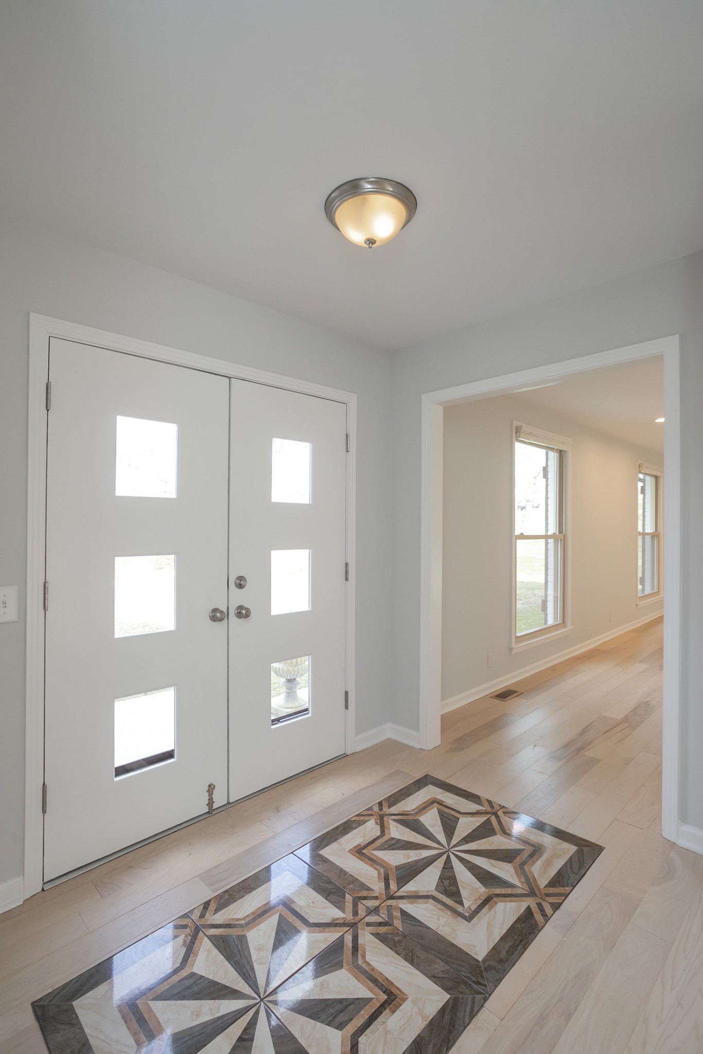 742 C Bates Road Lebanon, TN 37087 - Photo 12 of 59 a view of a livingroom with wooden floor and a window