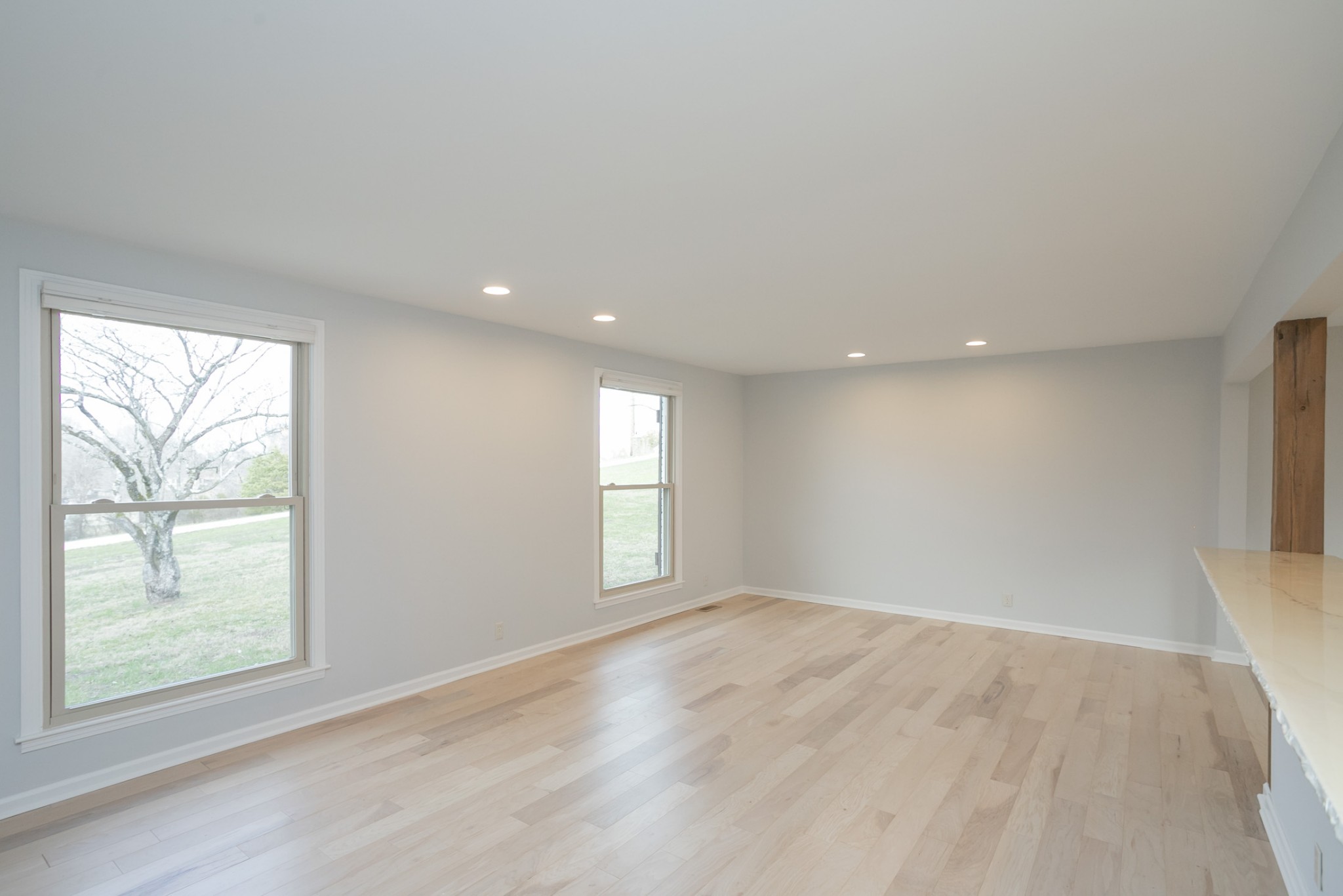 742 C Bates Road Lebanon, TN 37087 - Photo 19 of 59 wooden floor in an empty room with a window