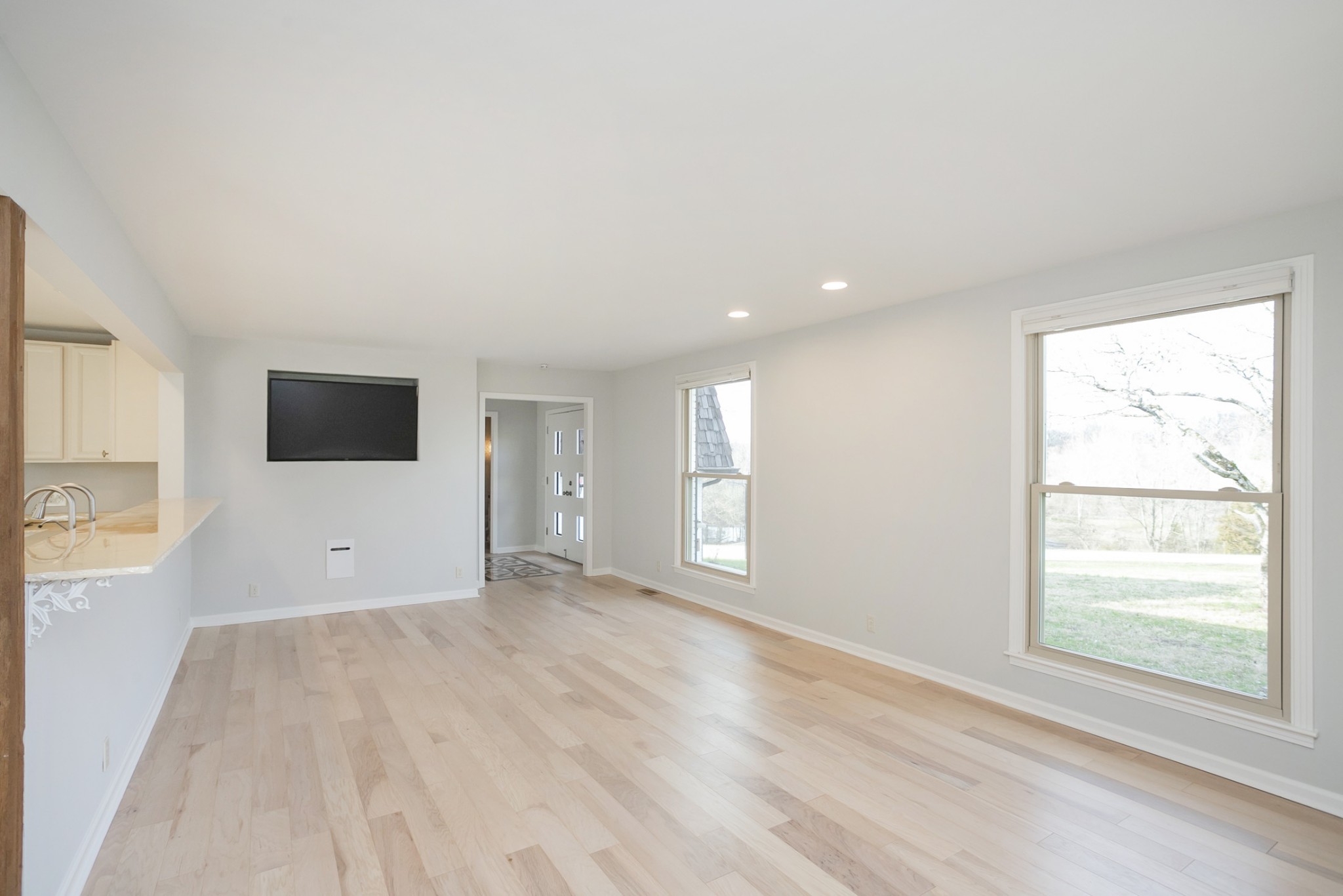 742 C Bates Road Lebanon, TN 37087 - Photo 21 of 59 an empty room with wooden floor and windows