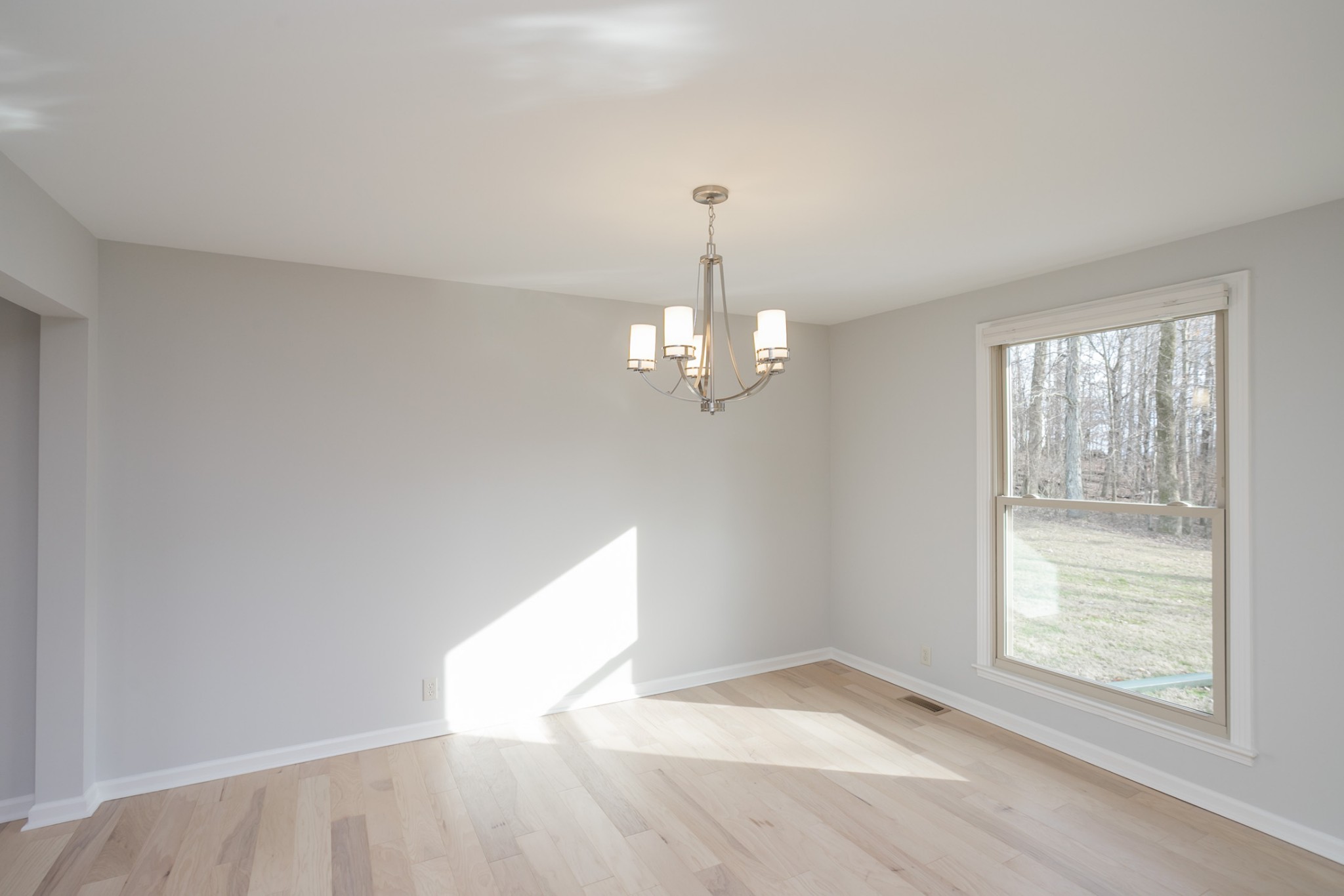 742 C Bates Road Lebanon, TN 37087 - Photo 29 of 59 wooden floor in an empty room with a window