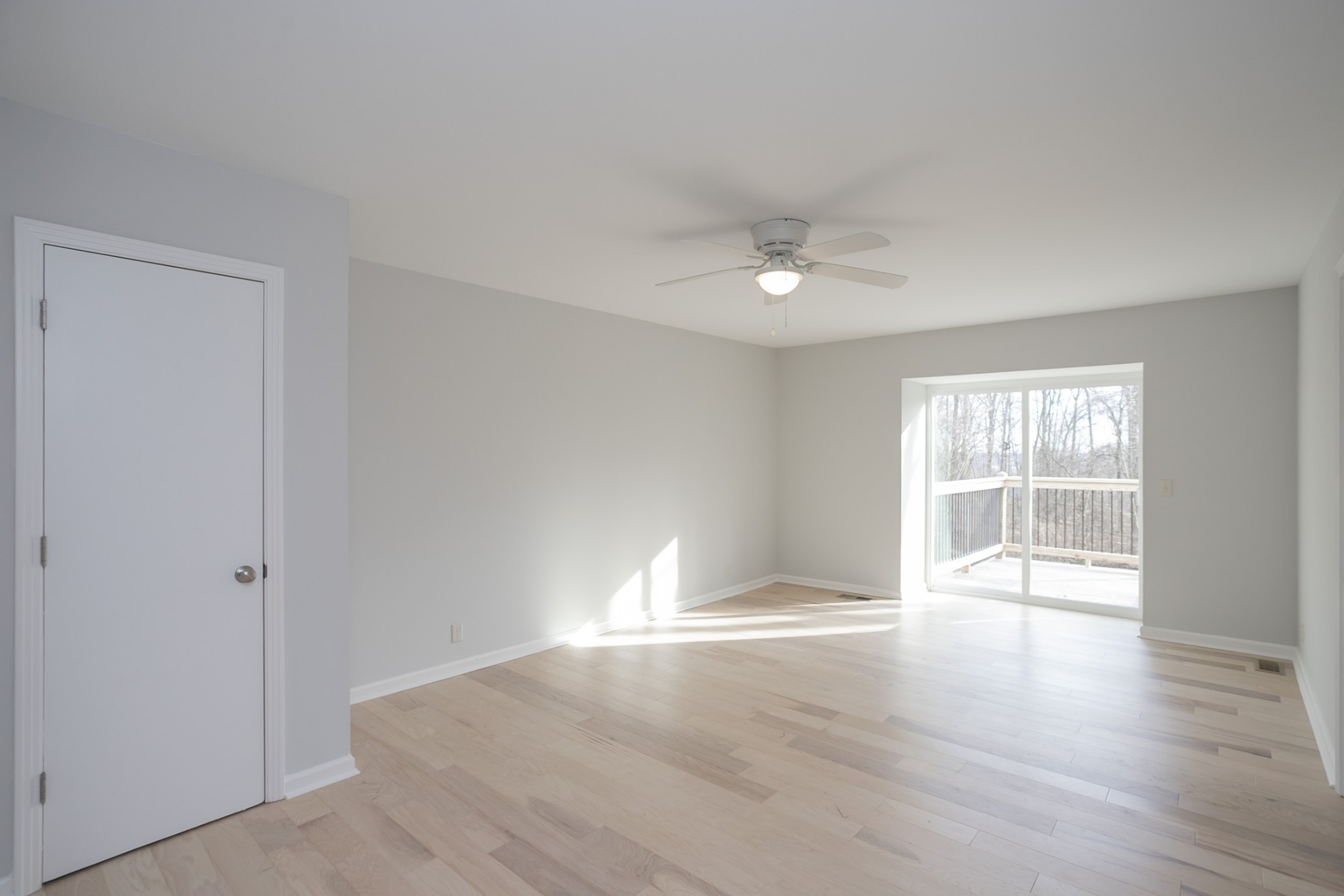 742 C Bates Road Lebanon, TN 37087 - Photo 30 of 59 a view of an empty room with wooden floor and a window