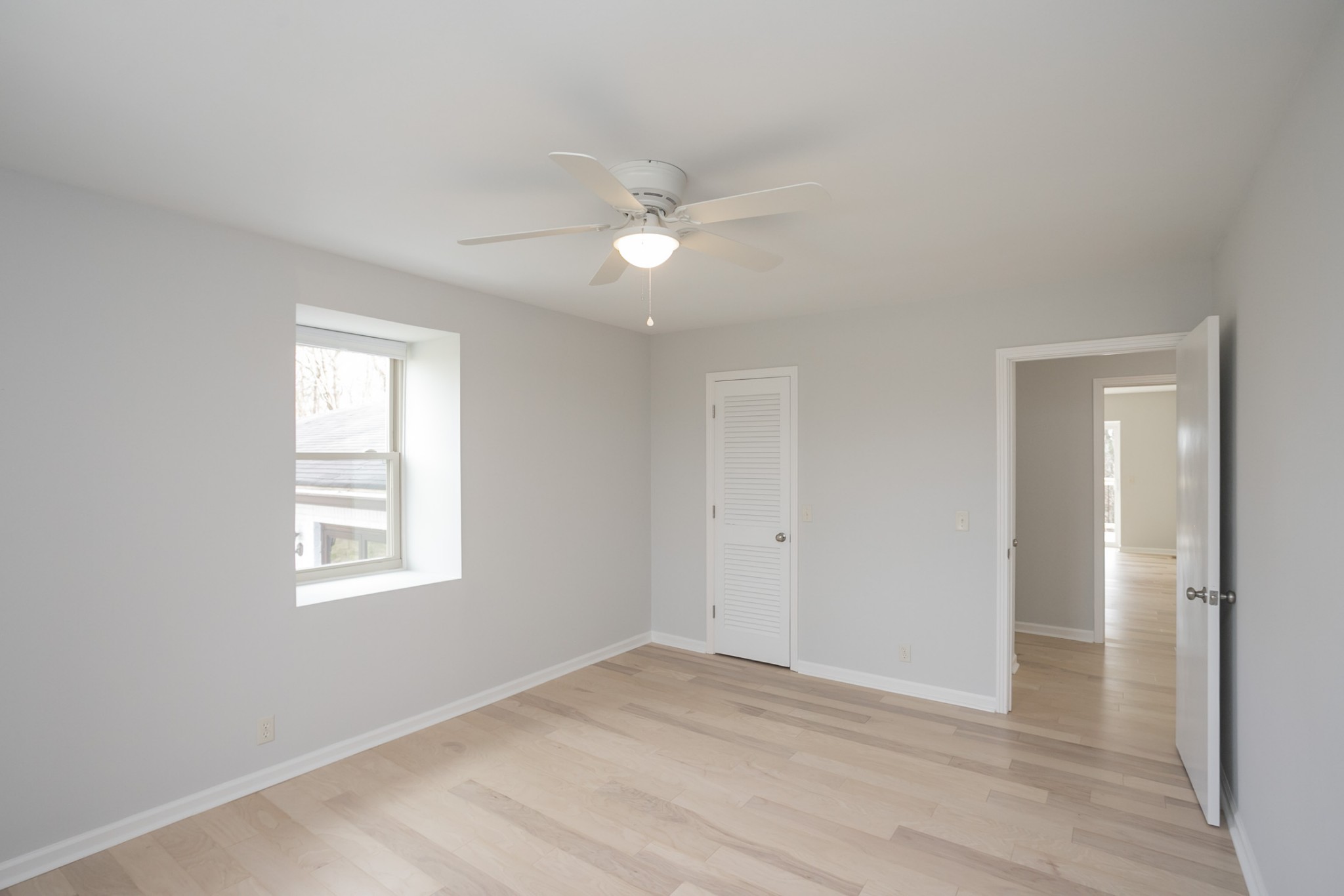 742 C Bates Road Lebanon, TN 37087 - Photo 39 of 59 wooden floor in an empty room with a window