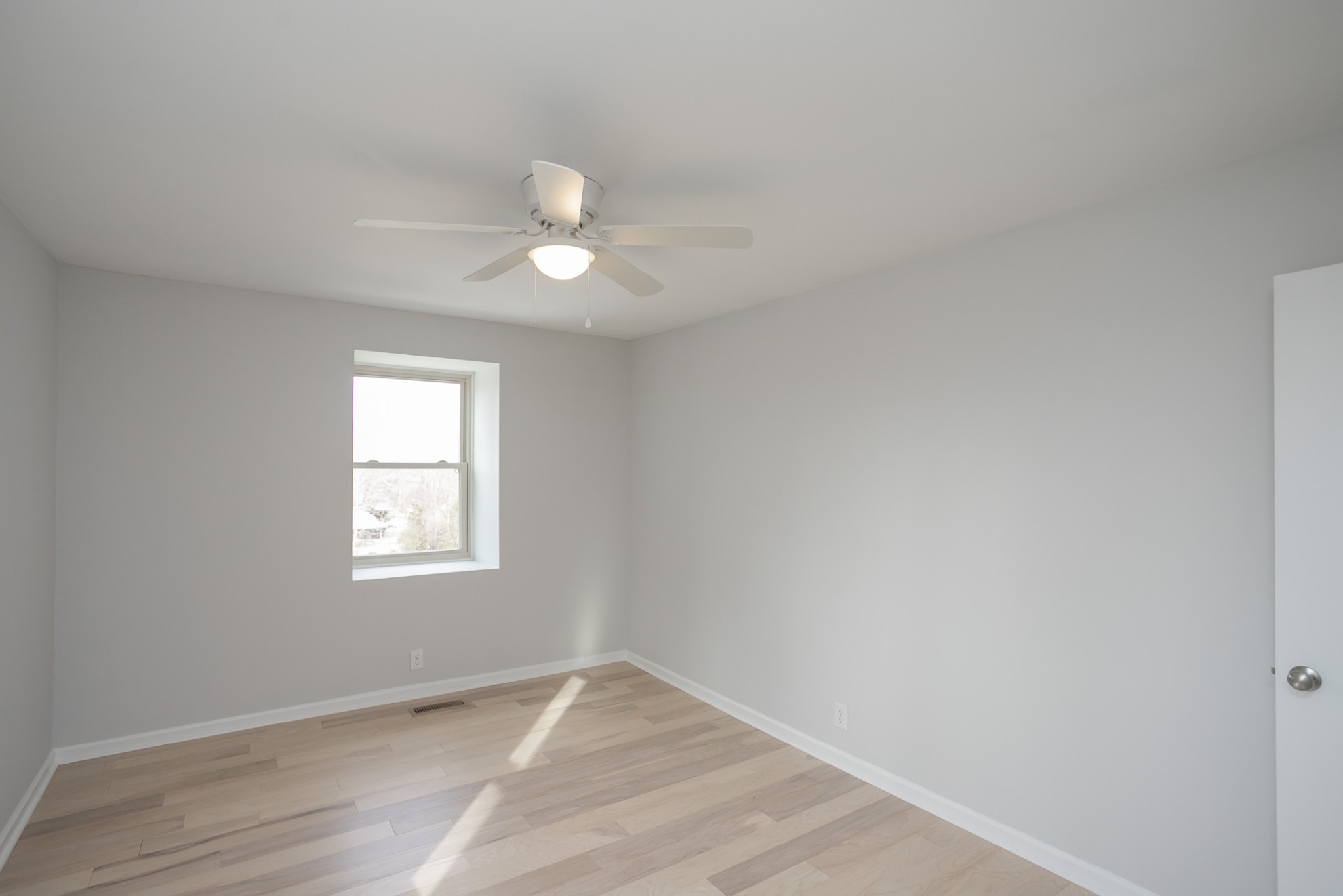 742 C Bates Road Lebanon, TN 37087 - Photo 48 of 59 an empty room with wooden floor and window