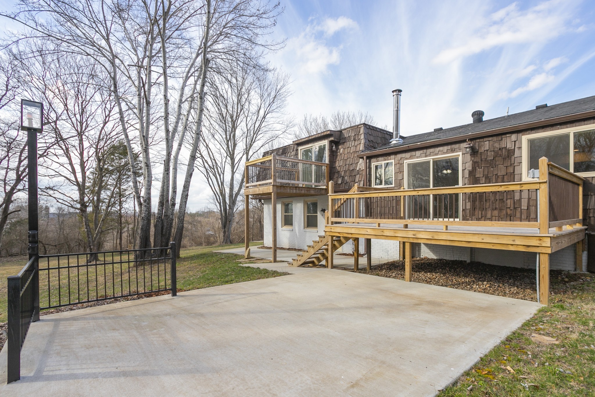742 C Bates Road Lebanon, TN 37087 - Photo 7 of 59 a view of a building with a yard and sitting area
