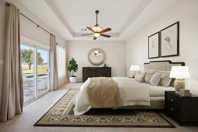 a bedroom with a bed lamp and a rug