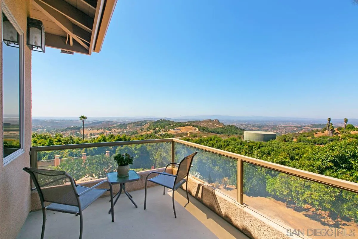 1629 Wild Acres Road Vista, CA 92084 - Photo 19 of 34 a view of a city from a balcony with furniture