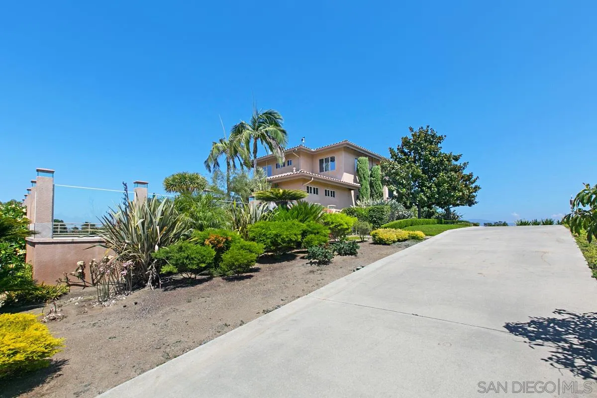 1629 Wild Acres Road Vista, CA 92084 - Photo 2 of 34 a house with a yard