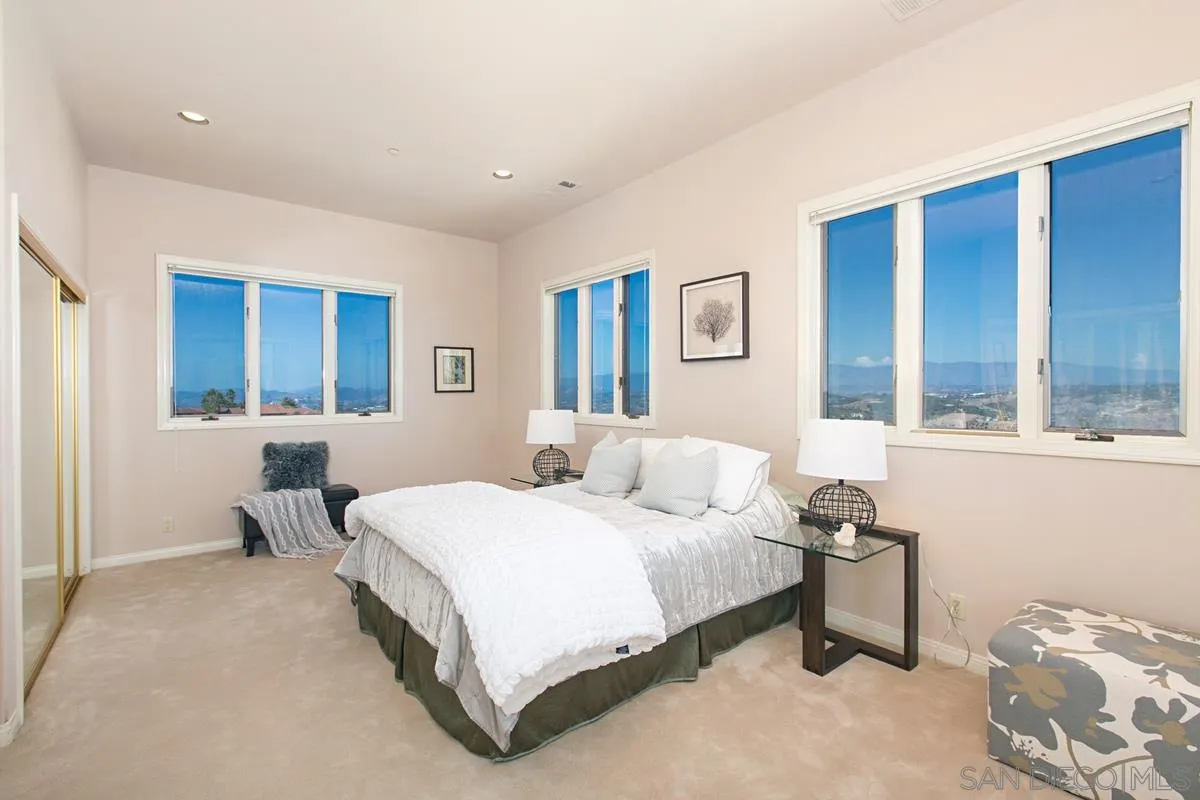 1629 Wild Acres Road Vista, CA 92084 - Photo 23 of 34 a bedroom with a bed and a window