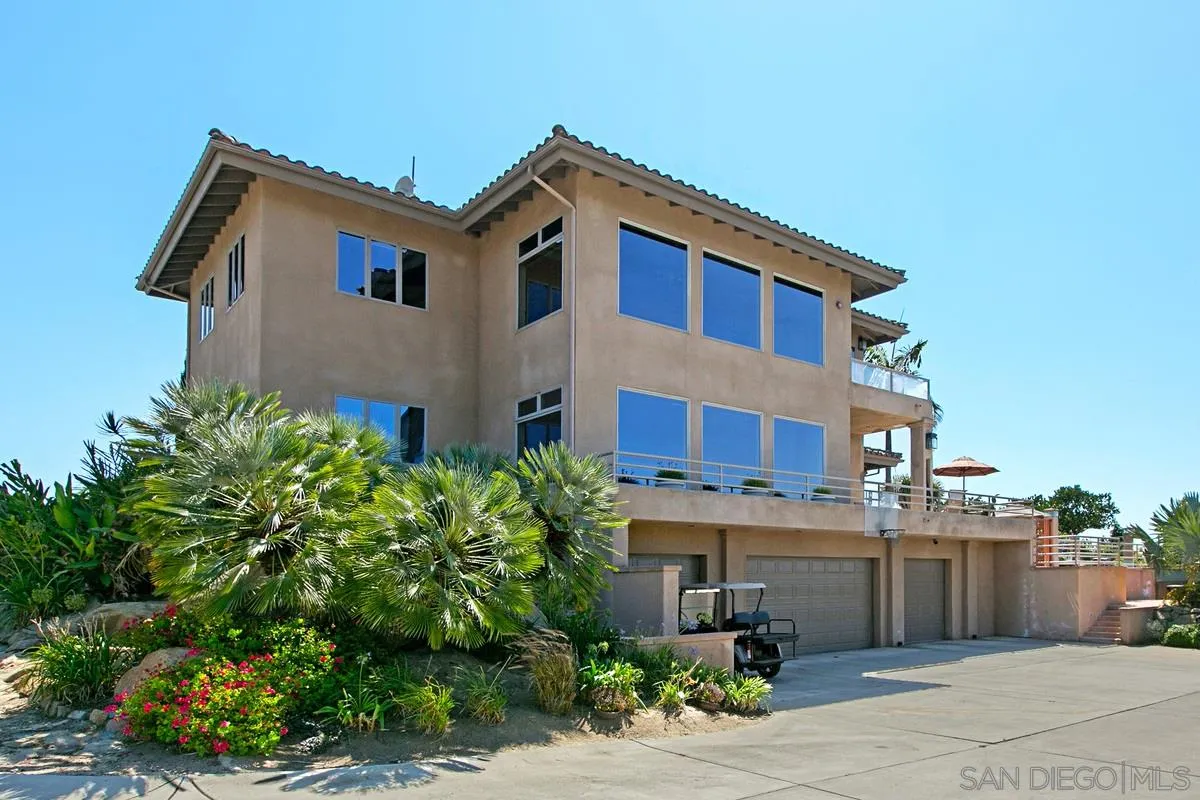1629 Wild Acres Road Vista, CA 92084 - Photo 24 of 34 a front view of a house with a garden