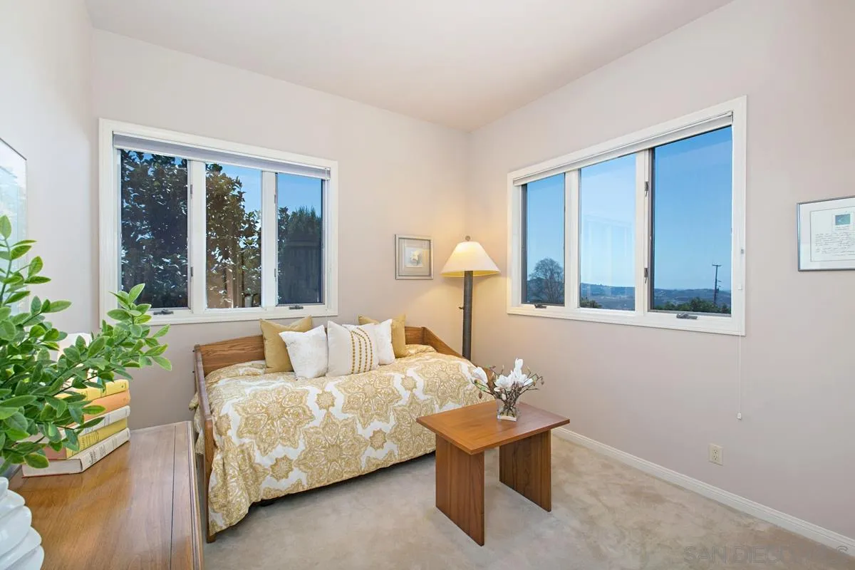 1629 Wild Acres Road Vista, CA 92084 - Photo 27 of 34 a living room with furniture and a potted plant