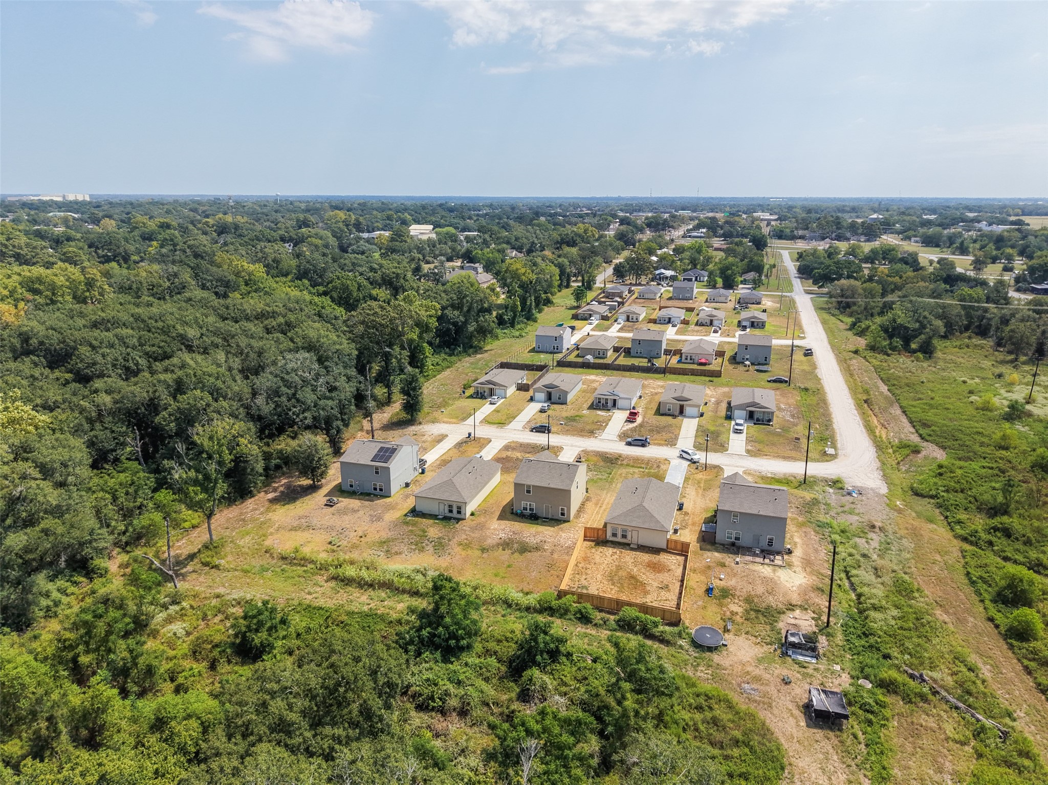 2537 18th Street Hempstead, TX 77445 - Photo 26 of 28 Elevated aerial perspective highlighting the community’s newer homes, paved streets, and surrounding open space.