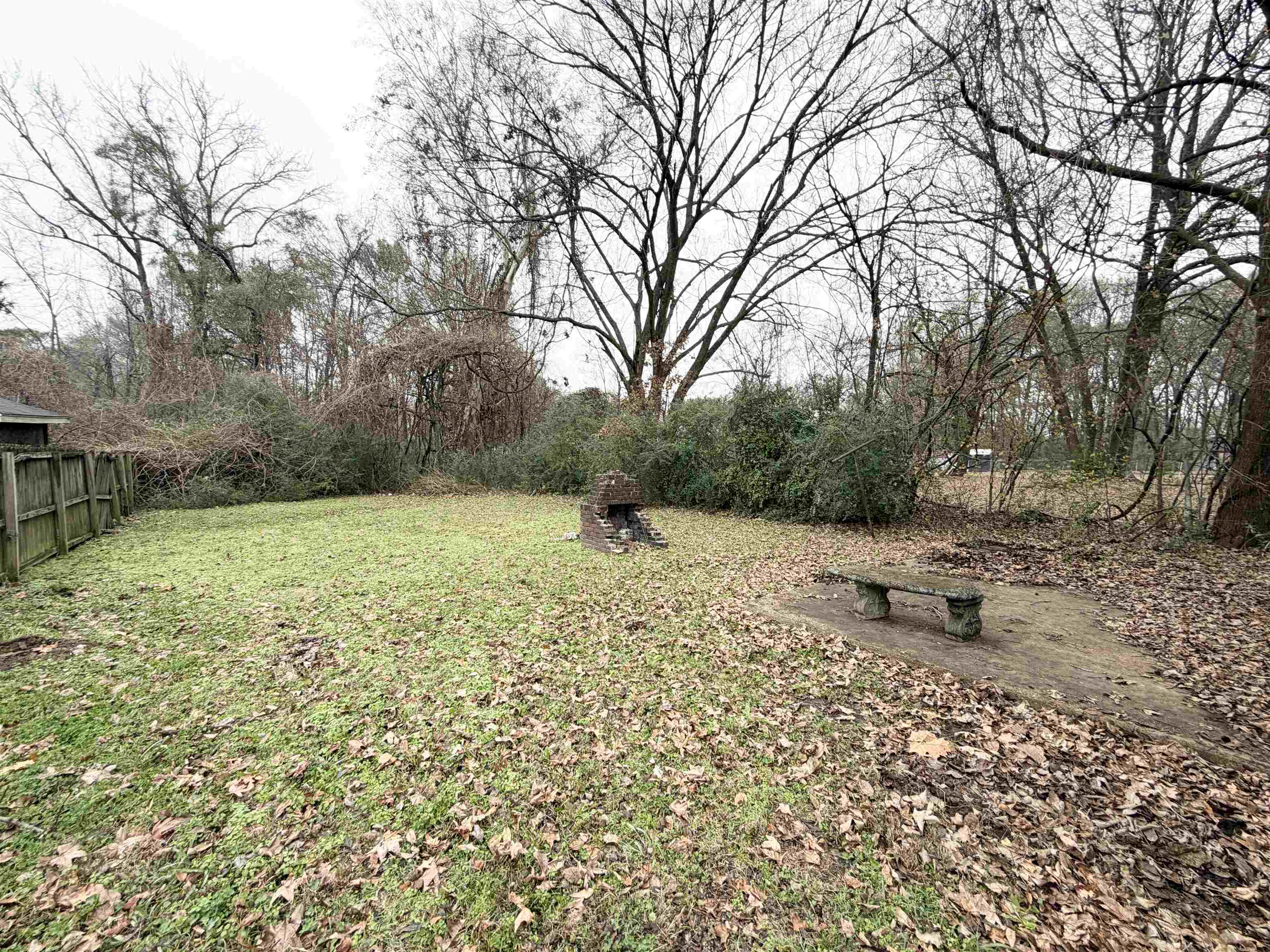 278 Hewlett Road Memphis, TN 38109 - Photo 13 of 13 a view of a bench in a yard