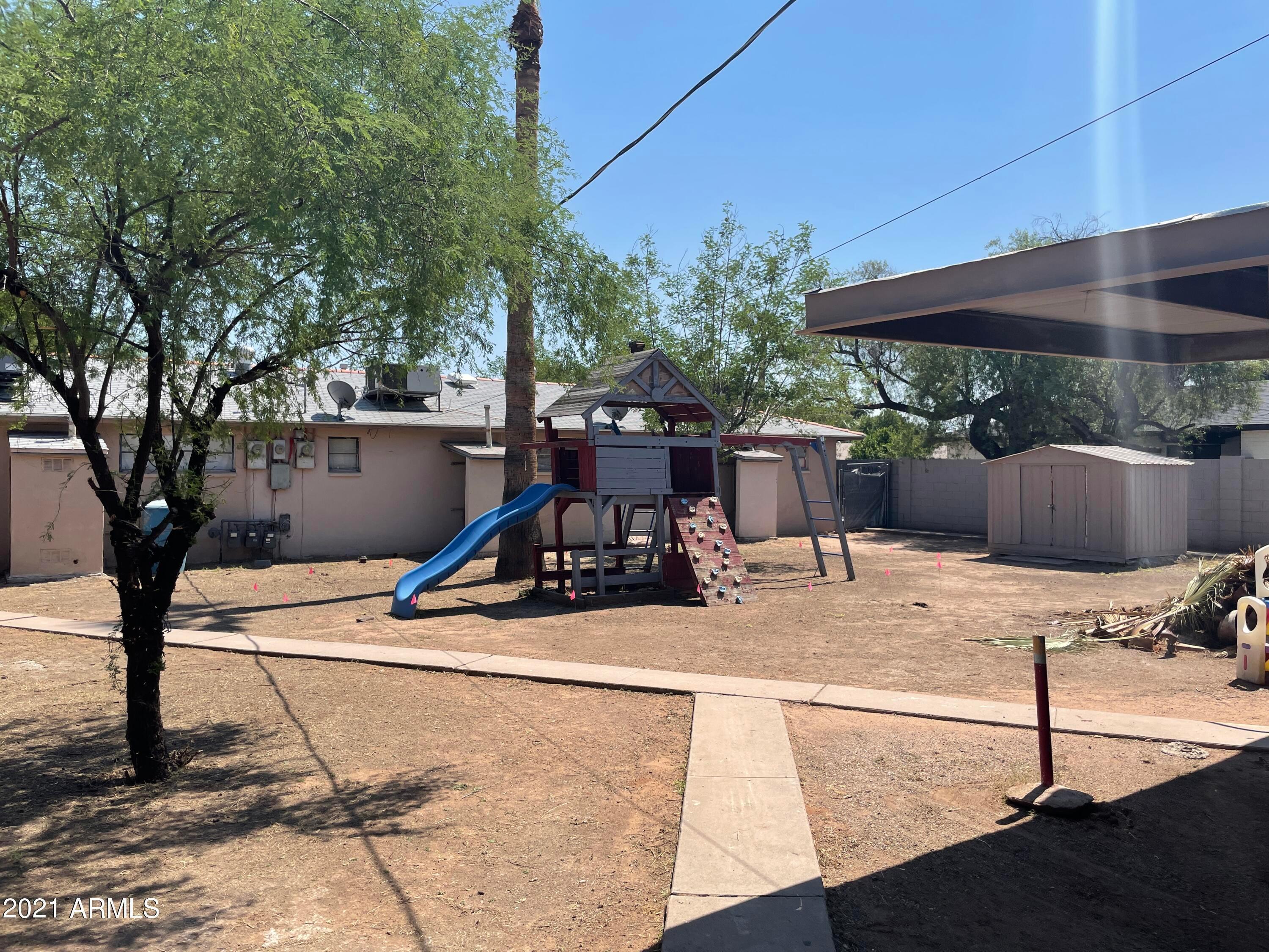 2242 North 29th Place, Unit 3 Phoenix, AZ 85008 - Photo 19 of 19 a view of outdoor space with seating