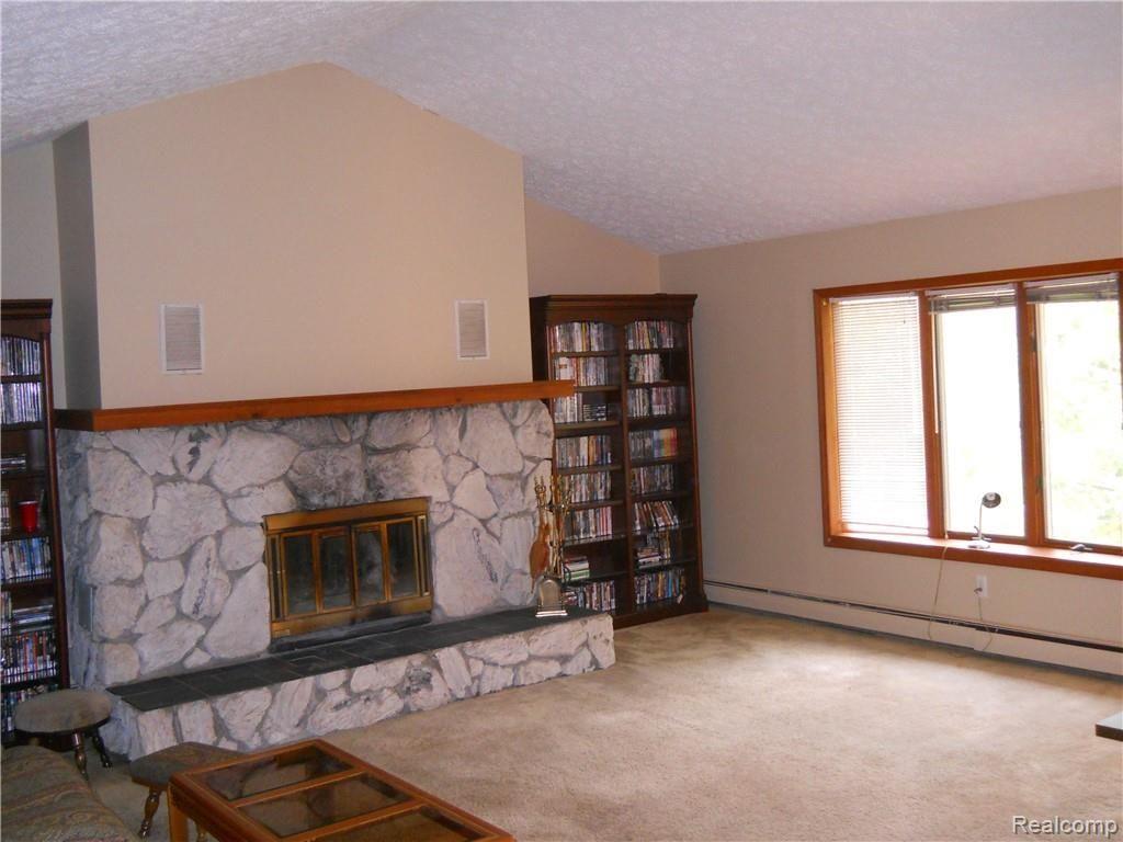 4237 Rurik Drive Howell, MI 48843 - Photo 12 of 37 family room w/cathedral ceiling