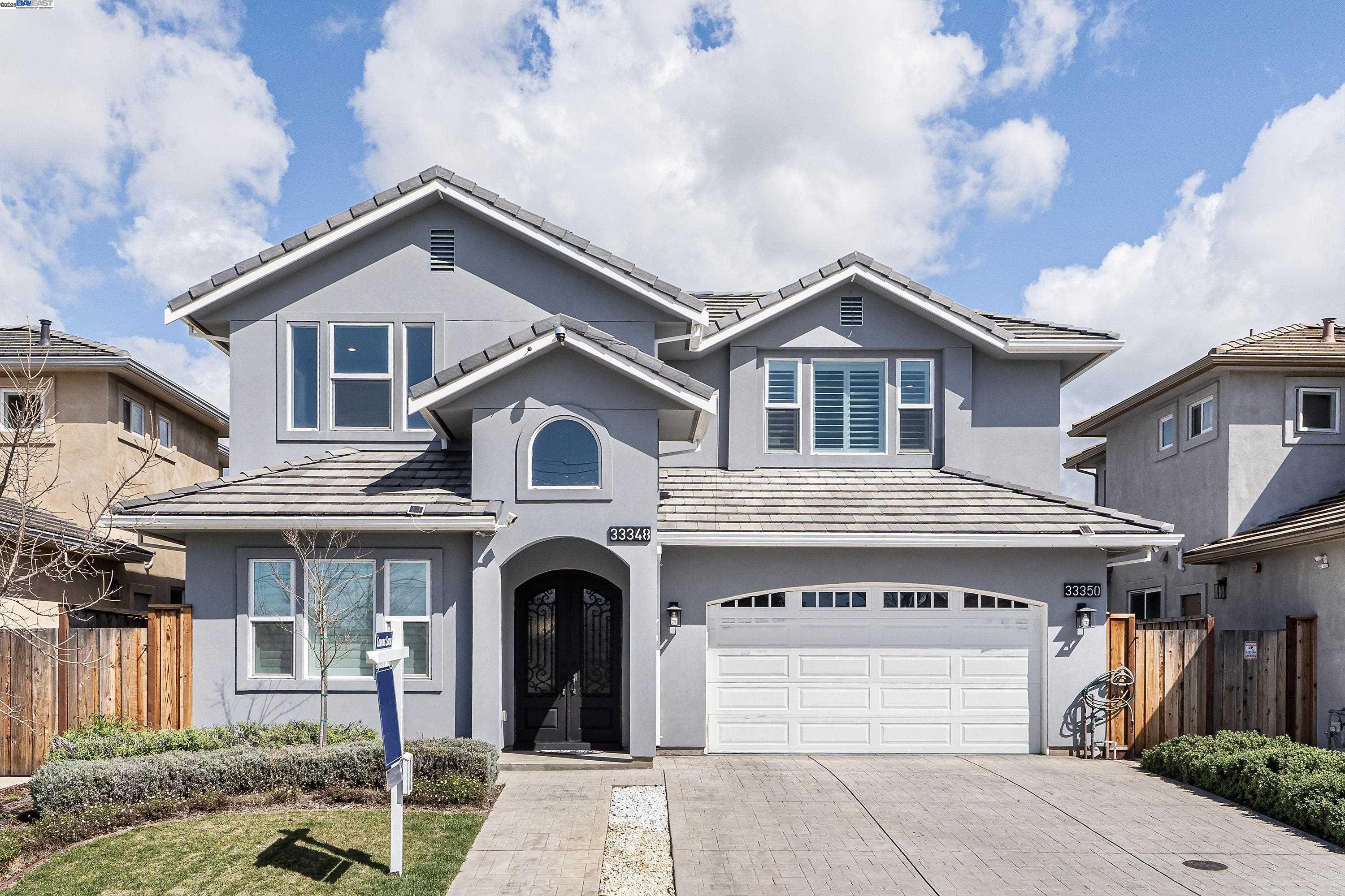 33348 Depot Road Union City, CA 94587 - Photo 1 of 1 a front view of a house with a yard