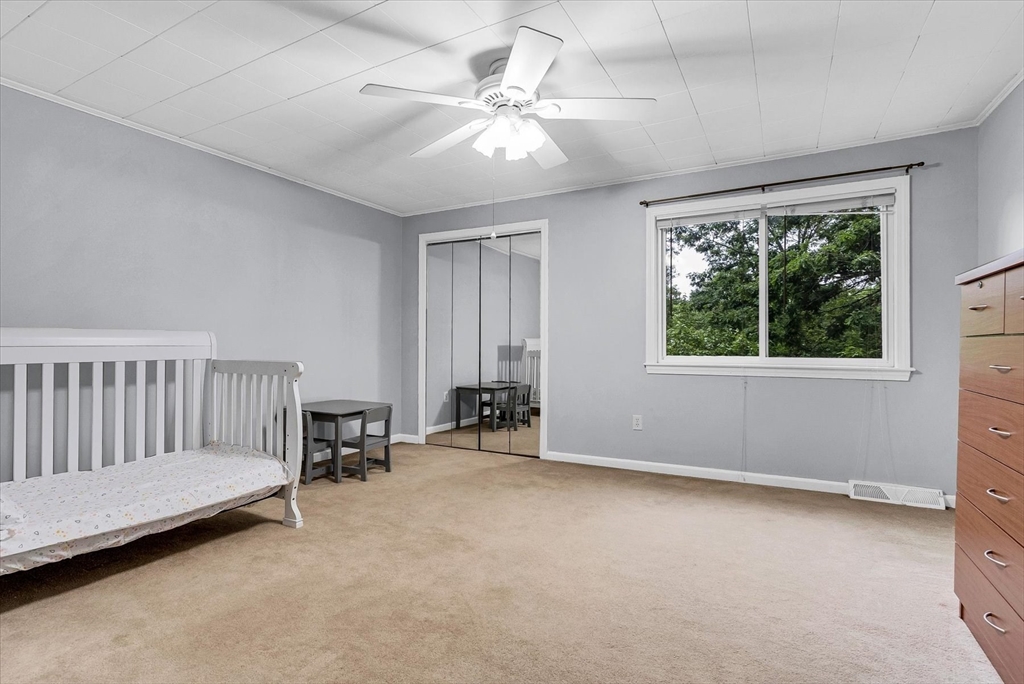 74 Meeting House Path, Unit 74 Ashland, MA 01721 - Photo 20 of 33 a view of an empty room with a window