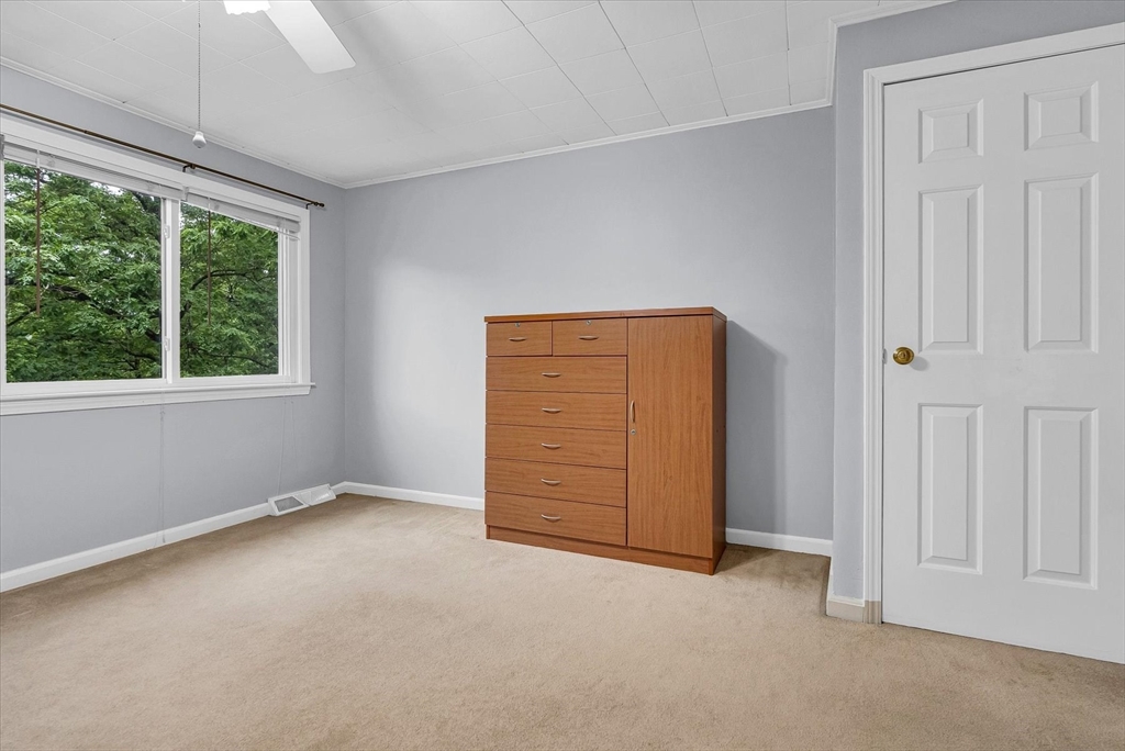 74 Meeting House Path, Unit 74 Ashland, MA 01721 - Photo 22 of 33 an empty room with windows and closet