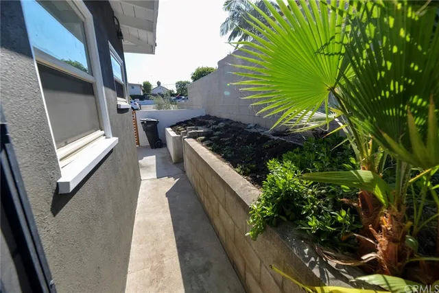 a kitchen with stainless steel appliances granite countertop a stove a sink and a oven
