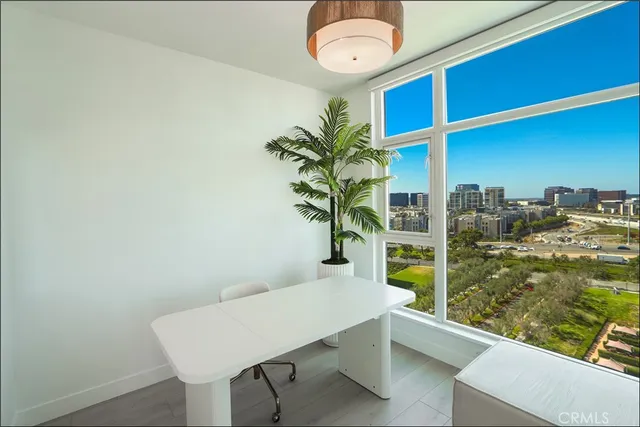 a view of a room with a table and chair