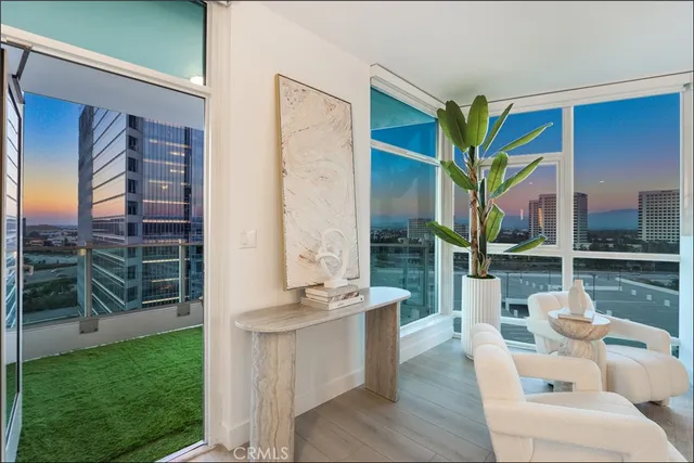 a view of an house with backyard and porch