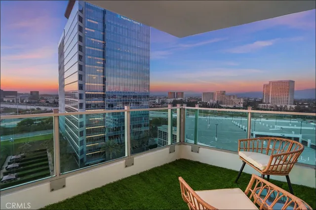 a view of a chairs and table in the terrace