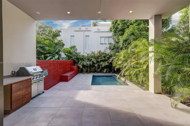 a house view with a garden space